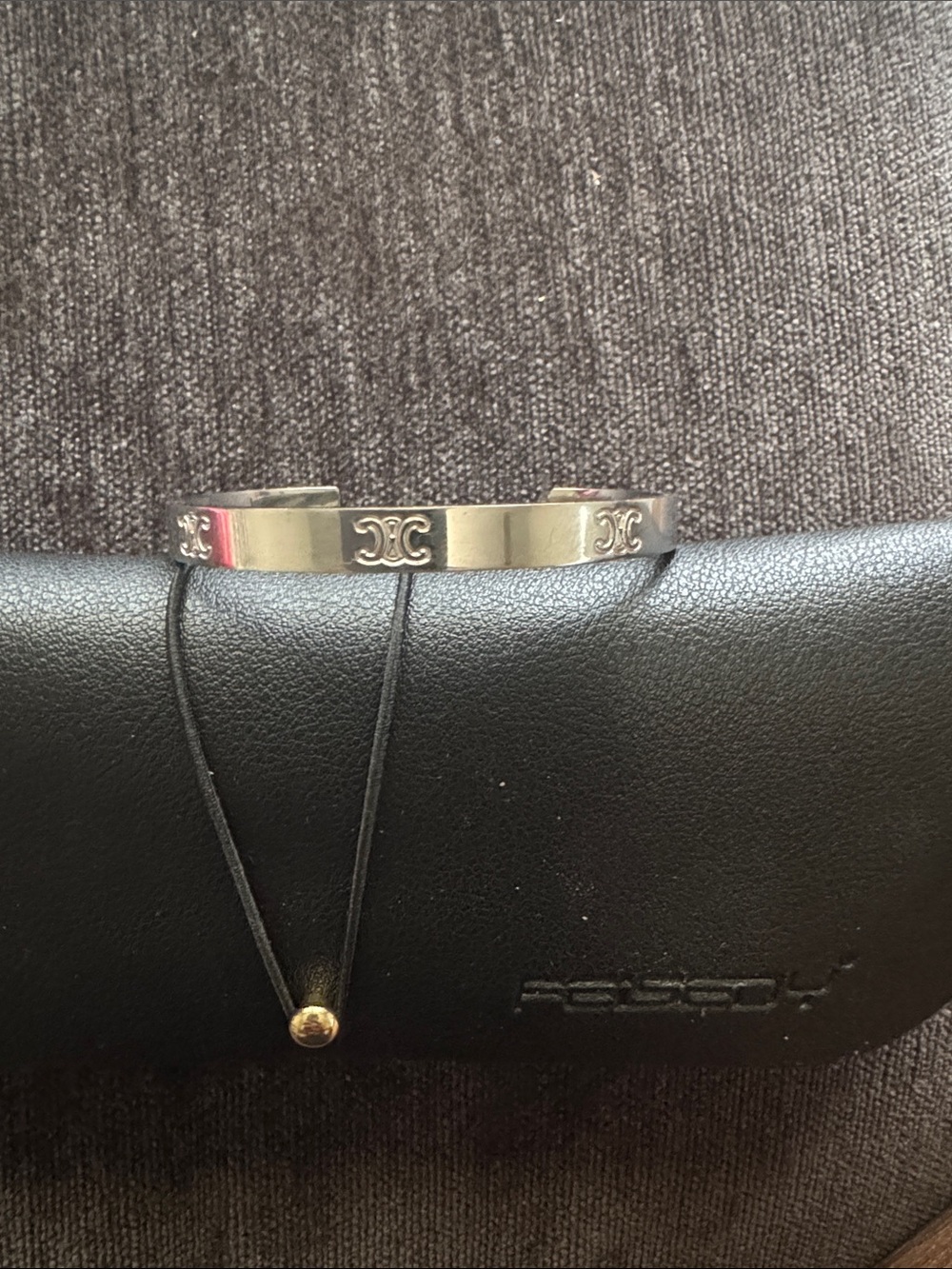 Stainless steel Cuff Bracelet with Repeating Logo